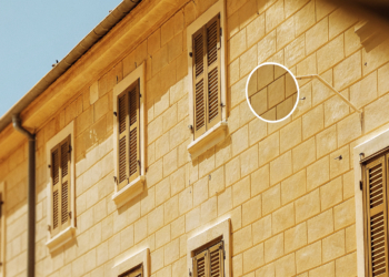 Illustration of Croatian apartment houses with an official registration tag, representing Croatia's 2027 Airbnb rules