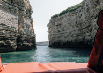 Rocky Adriatic cliffs dropping into clear sea on the Croatian coast